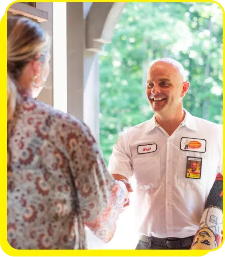 Technician greeting client